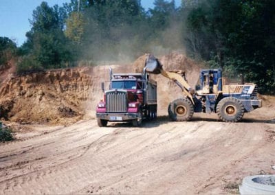 Track Loaders clearing the land